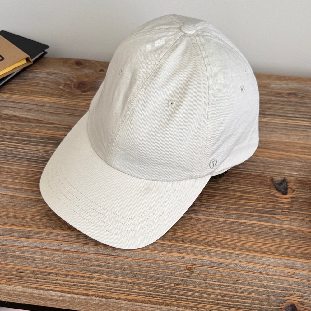 Lululemon Athletica off-white hat some stain as shown on size small